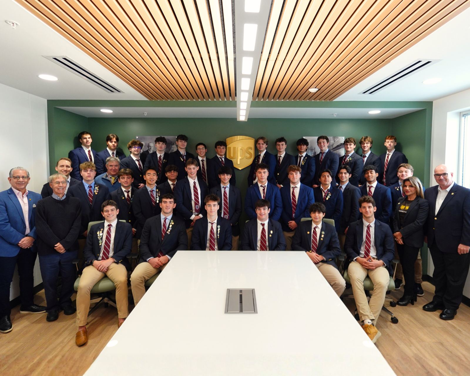 Don Bosco Prep L.E.O. students with UPS leaders during a site visit