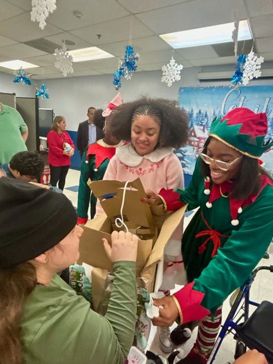 Photo 8 from Spreading Holiday Cheer: The Leonidas Foundation and UPS Deliver Joy to NJEDDA Students